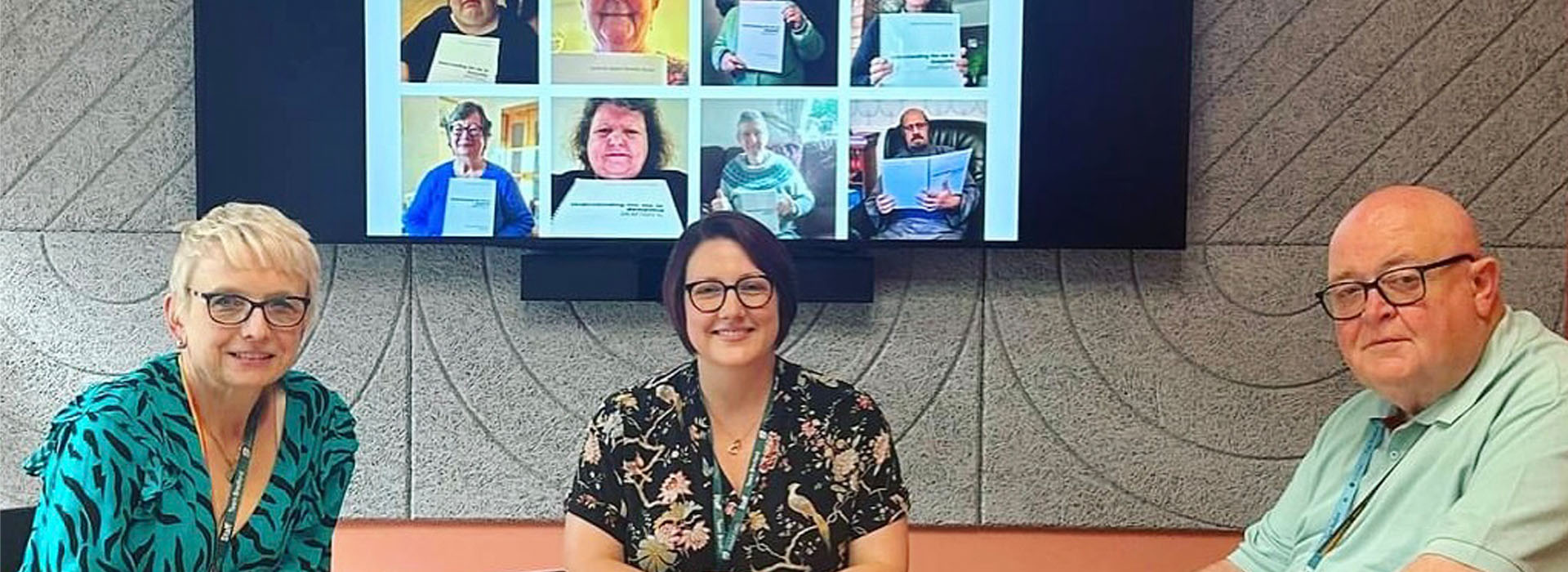 Clare Mason (Assistant Professor in Dementia Studies), Danielle Jones (Associate Professor in Dementia Studies), Michael Andrews (Expert by Experience) posing in a meeting space.